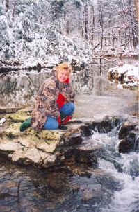 Linda at the creek in front of Oak Leaf Schoolhouse 