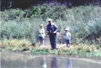 Wendell with two of his 4 grandchildren - Farm Pond